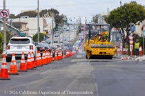 Cars traveling on new asphalt as Caltrans using heavy equipment continue the paving rehabilitation project on Northbound 19th Avenue from Sloat Boulevard to Lincoln Way as work continues on the 19th Avenue Paving and Rehabilitation project.