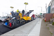Caltrans using heavy equipment to resurface the existing asphalt pavement on Northbound 19th Avenue from Sloat Boulevard to Lincoln Way as work continues on the 19th Avenue Paving and Rehabilitation project.