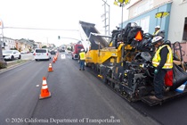 Cars traveling on resurfaced asphalt pavement on SR-1 as Caltrans uses heavy equipment to resurface the second lane on Northbound 19th Avenue from Sloat Boulevard to Lincoln Way as work continues on the 19th Avenue Paving and Rehabilitation project.