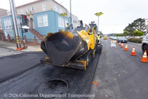 Cars traveling on resurfaced asphalt pavement on SR-1 as Caltrans uses heavy equipment to resurface the second lane on Northbound 19th Avenue from Sloat Boulevard to Lincoln Way as work continues on the 19th Avenue Paving and Rehabilitation project.