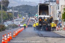 Caltrans using heavy equipment to resurface the existing asphalt pavement on Northbound 19th Avenue from Sloat Boulevard to Lincoln Way as work continues on the 19th Avenue Paving and Rehabilitation project.