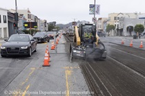 Cars traveling on 19th Avenue (State Route 1) as Caltrans is using heavy equipment to resurface the existing asphalt pavement on Southbound 19th Avenue from Lincoln Way to Sloat Boulevard as work continues on the 19th Avenue Paving and Rehabilitation project.