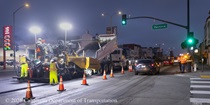 Caltrans uses heavy equipment to apply new pavement to Lane 1 of southbound Highway 1 (19th Avenue) at the intersection with Pacheco Street in San Francisco on the evening on May 8, 2026. Traffic continues to flow past the construction in Lane 3.