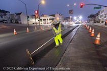 Caltrans crewmember works on the repaving of State Route 1 (19th Avenue) at the intersection with Pacheco Street on the evening of May 8, 2026.