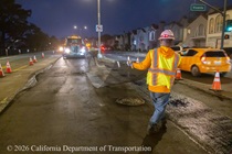 Two Caltrans crewmembers prepare the roadway for repaving on southbound Highway 1 (19th Avenue) as work continues on the 19th Avenue Paving and Rehabilitation project on the evening of May 8, 2026.
