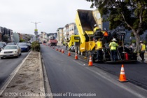 Caltrans paves the middle lane of 19th Avenue (State Route 1) on May 9, 2026. Cones separate the work area from the left lane, which is open to vehicle traffic.