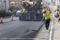 Caltrans crew uses heavy equipment and hand tools to repave southbound 19th Avenue (State Route 1) in San Francisco on May 9, 2026.