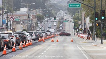 Traffic travels in the left lane of southbound 19th Avenue (State Route 1) in San Francisco on May 9, 2026 near the intersections with Santiago and Taraval streets. A car makes a right turn onto Taraval Street.