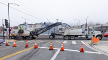 Cones block off the intersection of southbound 19th Avenue (State Route 1) and Pacheco Street as Caltrans uses heavy equipment to remove the old roadway surface and convey it into a truck for removal on May 10, 2026.