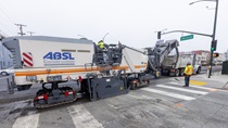 Caltrans uses heavy equipment to remove the old roadway surface and convey it into a truck for removal on southbound 19th Avenue (State Route 1) at Pacheco Street on May 10, 2026.