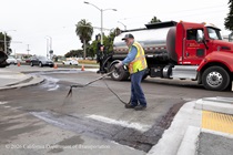 Caltrans worker prepping the surface of the asphalt on Southbound/Northbound 19th Avenue from Sloat Boulevard to Holloway Avenue as work continues on the third of three weekend closures for the 19th Avenue Rehabilitation Project.