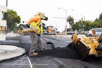Caltrans worker prepping the surface of the asphalt on Southbound/Northbound 19th Avenue from Sloat Boulevard to Holloway Avenue as work continues on the third of three weekend closures for the 19th Avenue Rehabilitation Project.