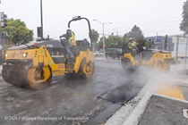 Caltrans using heavy equipment to prepare and resurface the existing asphalt pavement on Southbound/Northbound 19th Avenue from Sloat Boulevard to Holloway Avenue as work continues on the third of three weekend closures for the 19th Avenue Rehabilitation Project.