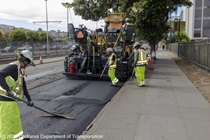 Caltrans workers using heavy equipment to prepare the resurface of SR-1 to replace the existing asphalt pavement on Southbound/Northbound 19th Avenue from Sloat Boulevard to Holloway Avenue as work continues on the third of three weekend closures for the 19th Avenue Rehabilitation Project.