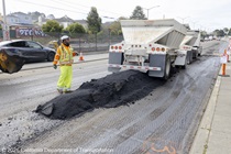 Caltrans workers using heavy equipment to prepare the resurface of SR-1 to replace the existing asphalt pavement on Southbound/Northbound 19th Avenue from Sloat Boulevard to Holloway Avenue as work continues on the third of three weekend closures for the 19th Avenue Rehabilitation Project.