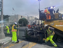 Caltrans workers using heavy equipment to prepare the resurface of SR-1 to replace the existing asphalt pavement on Southbound/Northbound 19th Avenue from Sloat Boulevard to Holloway Avenue as work continues on the third of three weekend closures for the 19th Avenue Rehabilitation Project.