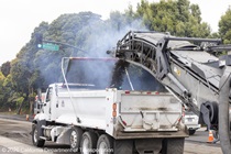 Caltrans using heavy equipment to prepare and resurface the existing asphalt pavement on Southbound/Northbound 19th Avenue from Sloat Boulevard to Holloway Avenue as work continues on the third of three weekend closures for the 19th Avenue Rehabilitation Project.
