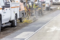 Caltrans workers prepping the surface of the asphalt on Southbound/Northbound 19th Avenue from Sloat Boulevard to Holloway Avenue as work continues on the third of three weekend closures for the 19th Avenue Rehabilitation Project.
