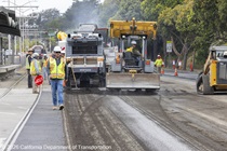Caltrans crew using heavy equipment to prepare and resurface the existing asphalt pavement on Southbound/Northbound 19th Avenue from Sloat Boulevard to Holloway Avenue as work continues on the third of three weekend closures for the 19th Avenue Rehabilitation Project.