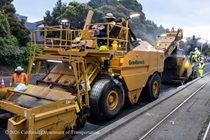 Caltrans crew using heavy equipment to prepare and resurface the existing asphalt pavement on Southbound/Northbound 19th Avenue from Sloat Boulevard to Holloway Avenue as work continues on the third of three weekend closures for the 19th Avenue Rehabilitation Project.