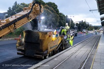 Caltrans crew using heavy equipment to prepare and resurface the existing asphalt pavement on Southbound/Northbound 19th Avenue from Sloat Boulevard to Holloway Avenue as work continues on the third of three weekend closures for the 19th Avenue Rehabilitation Project.