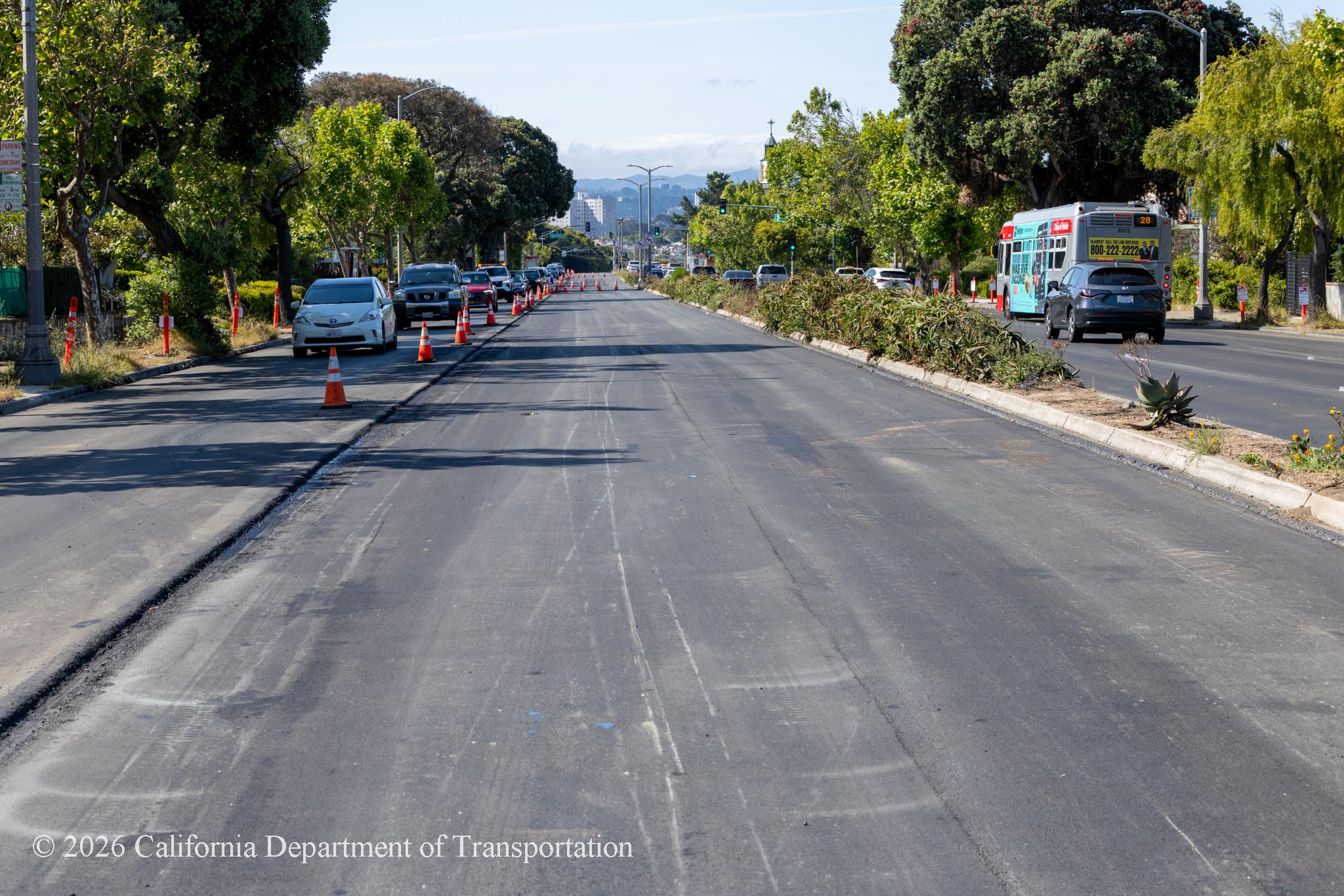 Cars traveling on newly resurfaced asphalt on 19th Avenue (State Route 1) as Caltrans continues resurfacing the existing asphalt pavement on Southbound/Northbound 19th Avenue from Sloat Boulevard to Holloway Avenue as work continues on the third of three weekend closures for the 19th Avenue Rehabilitation Project.