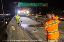 Caltrans crew prepares new road surface on Eastbound Interstate 80 in San Francisco on the night of April 17, 2026.