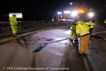 Caltrans crew prepares new road surface on Eastbound Interstate 80 in San Francisco on the night of April 17, 2026.
