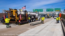 Caltrans crew prepares the new roadway surface on Eastbound I-80 in San Francisco on Saturday, April 18, 2026.