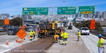 Caltrans crew prepares the new roadway surface on Eastbound I-80 in San Francisco on Saturday, April 18, 2026.