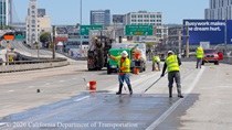 Caltrans crew prepares the new roadway surface on Eastbound I-80 in San Francisco on Saturday, April 18, 2026.