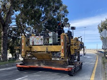 Heavy equipment is used to resurface an exit ramp on eastbound Interstate 80 in San Francisco on April 19, 2026.