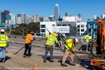 Caltrans crew with heavy equipment applying the polyester overlay on the WB I-80 Bayshore Freeway on October 24, 2026. The purpose of this closure is to perform the polyester overlay of the Bayshore viaduct between 4th street and the I-80/US-101 interchange.