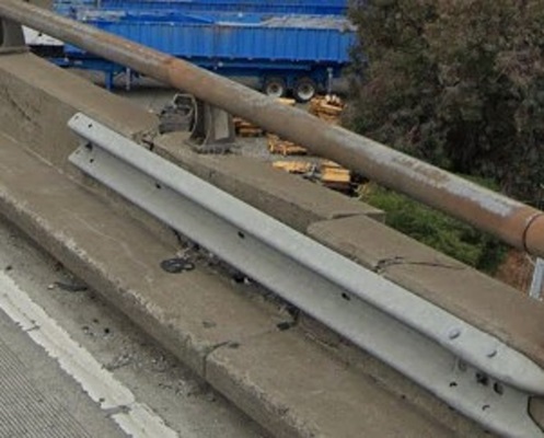 Temporary repair on damaged concrete barrier on northbound 101.