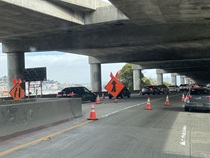 Cars travelling on northbound Interstate 280 (NB 280) as Caltrans crews does traffic control as part of the I-280 Rehabilitation and Pedestrian Overcrossing Project that involves installing a polyester concrete deck overlay to improve long‑term pavement durability and ride quality on Friday, October 4, 2026.