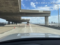 Northbound Interstate 280 (NB 280) where Caltrans has placed new polyester concrete as part of the I-280 Rehabilitation and Pedestrian Overcrossing Project that involves installing a polyester concrete deck overlay to improve long‑term pavement durability and ride quality on Friday, October 4, 2026.