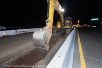 Caltrans uses heavy equipment to prepare the site for the construction of a new median barrier as part of the US 101 Hospital Curve Rehabilitation Project on March 13, 2026.