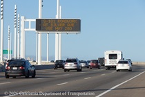 A changeable message sign on the eastern span of the Bay Bridge alerts motorists to road construction on southbound US 101 and recommends using Interstate 280 as an alternate route.