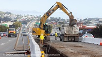 Caltrans crew works removes soil as part of the construction of a new median barrier during the San Francisco US-101 (Hospital Curve) Rehabilitation project on March 14, 2026.