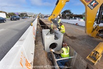 Caltrans crew install drainage infrastructure as part of construction of a new median barrier during the San Francisco US-101 (Hospital Curve) Rehabilitation project on March 14, 2026.