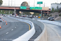 Temporary barriers on either side of the new median on US 101 near the exit for Paul Avenue.