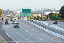 Traffic flows on either side of the construction zone for the new median on US 101 near the junction with Interstate 280 on March 15, 2026.