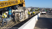 Caltrans crew using slipform paver for the construction of a new median barrier as part of the US 101 Hospital Curve Rehabilitation Project on March 28, 2026.
