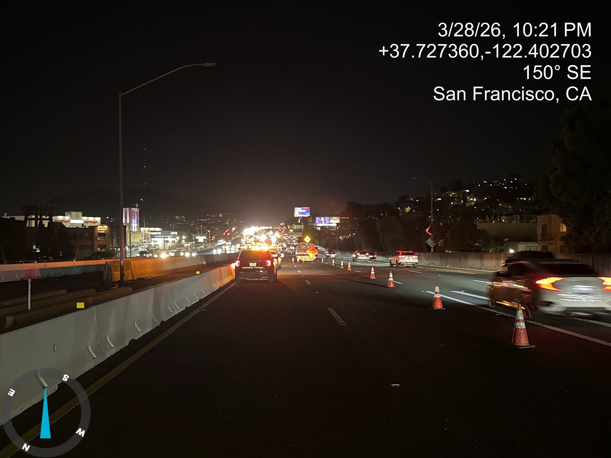 Cars traveling on US 101 as Caltrans is working on the construction of a new median barrier as part of the US 101 Hospital Curve Rehabilitation Project on March 28, 2026.