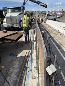 Caltrans crew using heavy equipment building the new median barrier as part of the US 101 Hospital Curve Rehabilitation Project on March 29, 2026.
