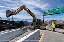 Heavy equipment is used in the installation of drainage infrastructure on U.S. 101 on August 22, 2026.