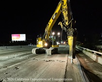 Caltrans using an excavator with a hydraulic breaker to demolish old concrete pavement on northbound U.S. 101 Bayshore Freeway (Hospital Curve) in San Francisco on September 4, 2026.