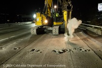 Caltrans using an excavator with a hydraulic breaker to demolish old concrete pavement on northbound U.S. 101 Bayshore Freeway (Hospital Curve) in San Francisco on September 4, 2026.