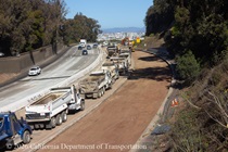 Caltrans trucks lined up next to removed concrete pavement on northbound U.S. 101 Bayshore Freeway (Hospital Curve) in San Francisco on September 5, 2026.