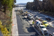 Caltrans crews using heavy equipment to pour new concrete pavement on northbound U.S. 101 Bayshore Freeway (Hospital Curve) in San Francisco on September 5, 2026.